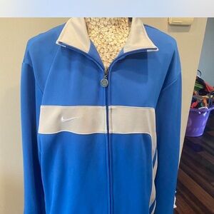 Nike Blue and Gray Apparel track jacket is oversized small
